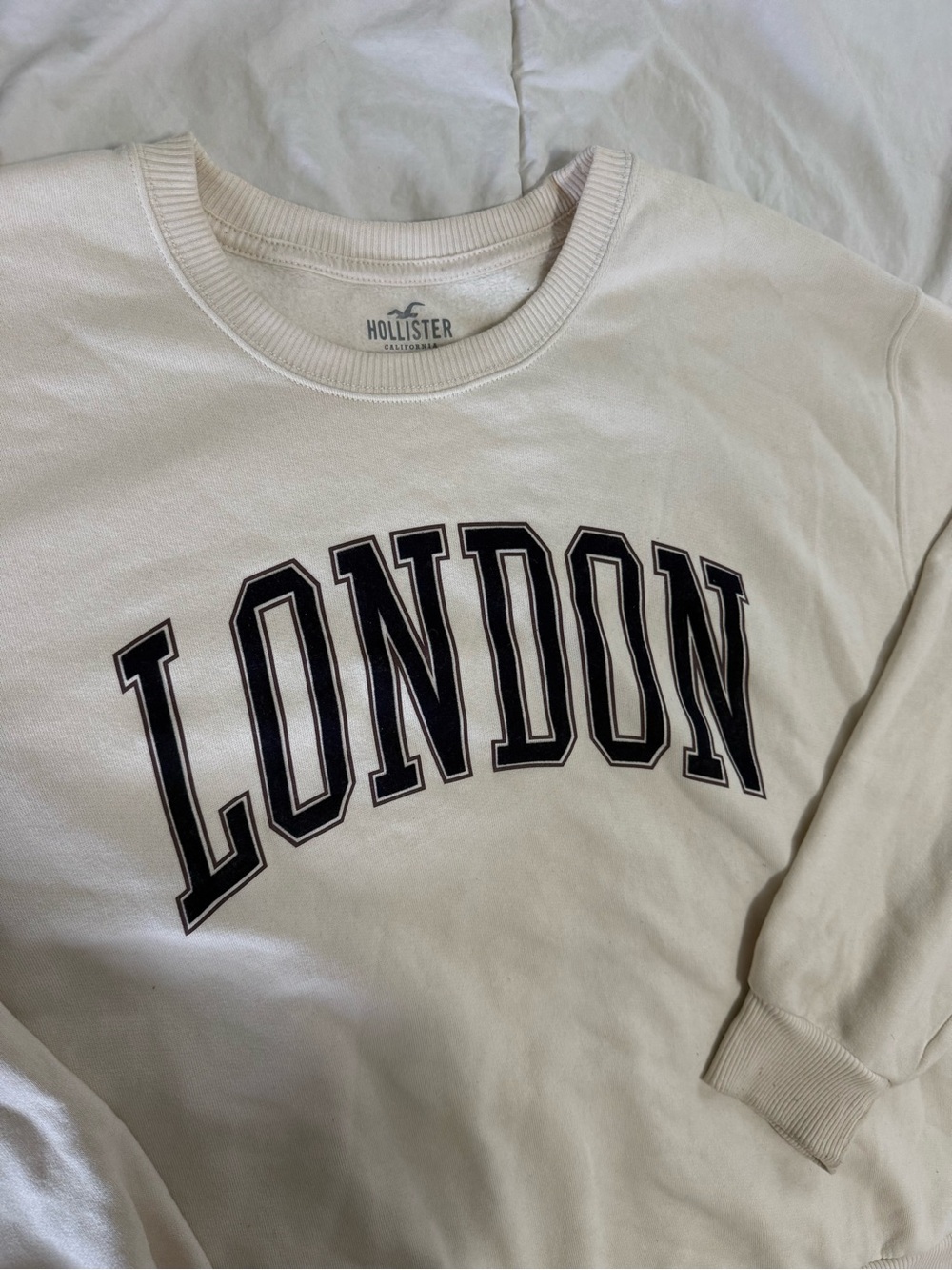 Hollister Cream Crewneck Sweatshirt with Black London Lettering